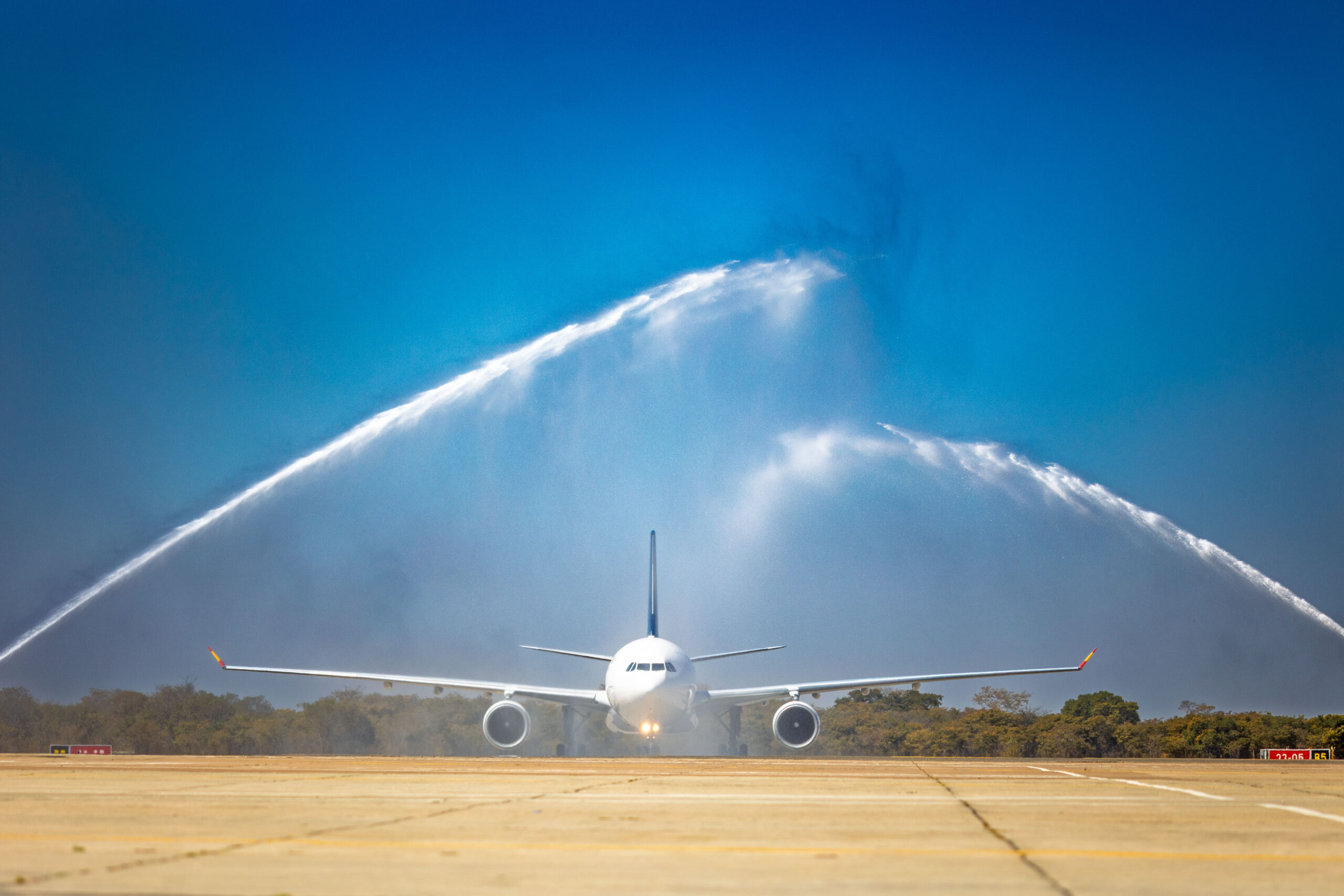 Air Zimbabwe aircraft receiving a water salute during the 2026 London service launch